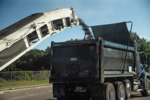 One of Whitney's dump trucks getting filled with gravel for an upcoming hauling job.