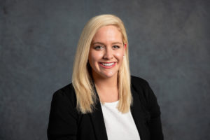 Headshot of Katy Guion, Senior Marketing & Engagement Manager of Whitney Logistics